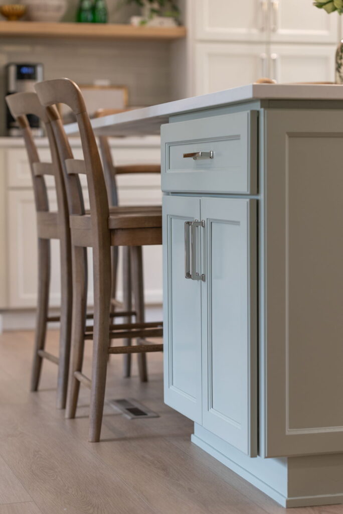 Lovely stools around the kitchen island after the remodel